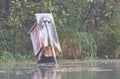 Dilapidated Wood Duck nesting box on a pond in northern Wisconsin