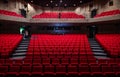 Dilbeek, Flemish Brabant, Belgium - Red velvet chairs of a performing arts concert hall