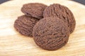 Dilicious chocolate cookies on woogen plate Royalty Free Stock Photo