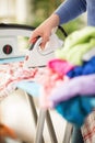 Diligent hands of young woman ironing Royalty Free Stock Photo