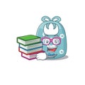 A diligent student in baby apron mascot design concept read many books Royalty Free Stock Photo