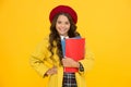 Diligent student. retro girl wear uniform and parisian beret. kid school fashion. cheerful child ready for schoolyear Royalty Free Stock Photo