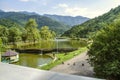 Artificial reservoir on the Aghstev river with a summer gazebo on the water