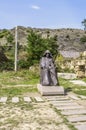 Dilijan, Armenia, August 24, 2018: The Monument to the great Armenian philosopher Mkhitar Gosh in front of the Goshavank monastery