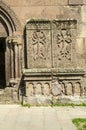 Two medieval openwork khachkars at the wall of the Church of St. George in the monastery of Goshavank, near the town of Dilijan