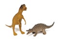 A Dilophosaurus and another low back scaly dinosaur toy figurines