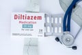 Diltiazem medication concept photo. On doctor table is package of cardiac drug with pills and generic name `Diltiazem medication` Royalty Free Stock Photo