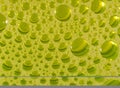 Diluted detergent bubbles in glass Royalty Free Stock Photo
