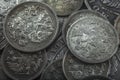 Dim gloss of old silver coins