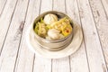 Dim sum and assorted steamed gyozas cooked by a Chinese chef