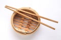 Dim Sum Bamboo Steamer Basket with Chopsticks Royalty Free Stock Photo