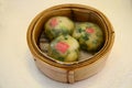 Dim Sum dumpling vegetable stuffed steamer in bamboo basket