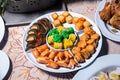 Dim sum in plate. Assorted dim sum appetizers on table background. Set of Chinese food for share Royalty Free Stock Photo