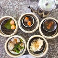 Dim sum , this is a popular Chinese food which were steamed. They are in the small bamboo basket. The picture on the right is the Royalty Free Stock Photo