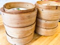 Dim sum , this is a popular Chinese food which were steamed. They are in the small bamboo basket Royalty Free Stock Photo