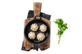 Dim sum stuffed meat dumplings in a pan with herbs Isolated on white background, top view. Royalty Free Stock Photo