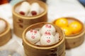 Dim sum, traditional Chinese dumpling in bamboo steamer, pig and animal theme for kids. Street food for children in China, Hong Royalty Free Stock Photo