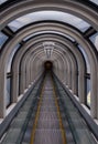 Diminishing perspective in a futuristic escalator tube
