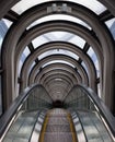 Diminishing perspective in a futuristic escalator tube