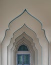 Diminishing perspective interior view of inner hallway leading into entrance door at Bang O mosque