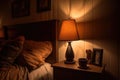 dimly lit bedside lamp creating warm ambiance Royalty Free Stock Photo