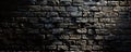 Dimly lit black brick wall background Royalty Free Stock Photo