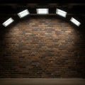 Dimly lit brick wall illuminated by six overhead rectangular lights, creating a dramatic Royalty Free Stock Photo