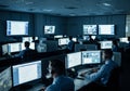 Dimly lit control room with multiple Royalty Free Stock Photo