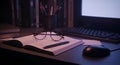Cozy Study Desk with Books, Glasses, and Computer Royalty Free Stock Photo