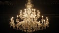 Dimmed dazzle A majestic chandelier casts a gentle glow over a sea of twirling aristocrats creating a captivating scene Royalty Free Stock Photo