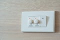 Dimmer switch and light switch on switchboard