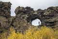 Dimmuborgir lava arch hole on hiking trail, Iceland