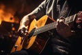 In dimness, a guitarist\'s nimble fingers create a mesmerizing acoustic symphony. Royalty Free Stock Photo