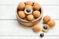 Dimocarpus longan exotic fruits on wooden bowl background - Fresh Longan tropical fruit in Thailand