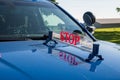 Dimondale MI - June 4, 2022: State of Michigan State Police car with stop sign