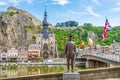 View at the enbankment of Meuse river with mwmorial and bridge of Charles de Gaullein in Dinant - Belgium