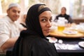 We always dine as a family. a muslim family eating together. Royalty Free Stock Photo