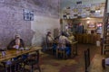 Diners drink coffee and chew the fat at Imogenes's Cafe and Baked Goods, San Augustine,. Space, Texas