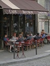 Diners enjoy a lunch at an outdoor bistro