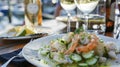 Diners enjoy a seafood feast in a picturesque cove savoring grilled halibut tangy shrimp ceviche and refreshing cucumber Royalty Free Stock Photo