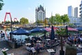 Diners enjoying alfresco dining with a view of the Witte Huis (White House) at Wijnhaven