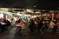 Diners eating in crowded Los Angeles Farmers Market food court