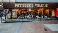 Diners through a window at Patisserie Valerie cafe in Hammersmith, London