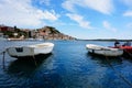 Dinghies moored at island