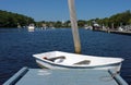 Dinghy at end of dock Royalty Free Stock Photo