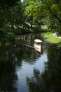 Dinghy at pilsetas kanals city pond on a summer day, Riga, Latvia