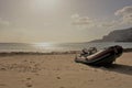 dinghy on the shoreline of a beach Royalty Free Stock Photo
