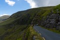 Cars try to pass each other on the very narrow road leading to Connor Pass on the Dingle Peninsula in County Kerry