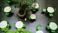 Dining area with green motif in urban mall - high angle view - no people Royalty Free Stock Photo