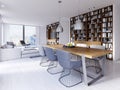 Dining area with a modern designer table with six chairs in a loft style. Large built-in shelves for books, kitchen and living Royalty Free Stock Photo